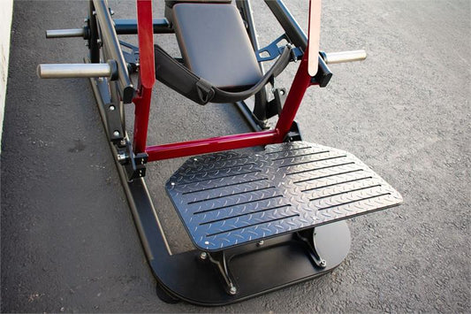 Plate load hip thruster machine|Up close view|In use start position|In use thrust position