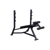 Olympic Decline Bench|Bench in use|Leg hold down adjustment|Bench loaded with weights