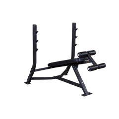 Olympic Decline Bench|Bench in use|Leg hold down adjustment|Bench loaded with weights