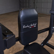 Olympic Shoulder Press Bench|Bench loaded with weights|In use|Safety crash bars|Seat back rest|Spotter Platform