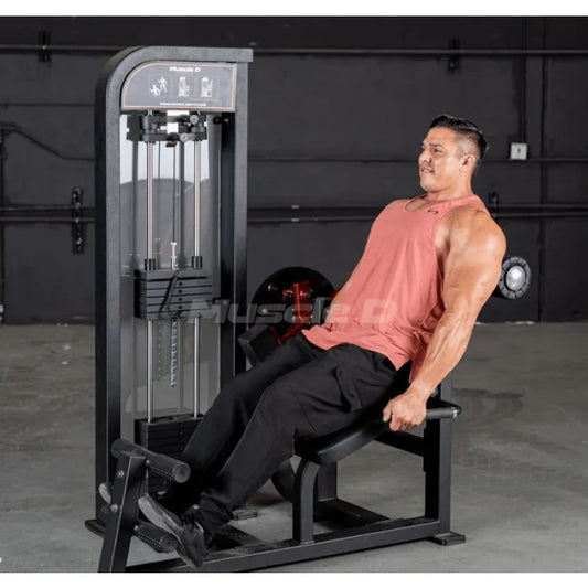 Athlete shown using machine in back extension position