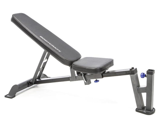 Bench Front Angle|Bench Side View|Bench Flat Position|Bench Side Positions|Seat Adjustment Pin|Transport Wheels|Leg Curl Attachment|Leg Extension|Leg Hold Down Lock|Upright storage