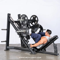 Athlete using the leg press machine in a gym setting with a white background