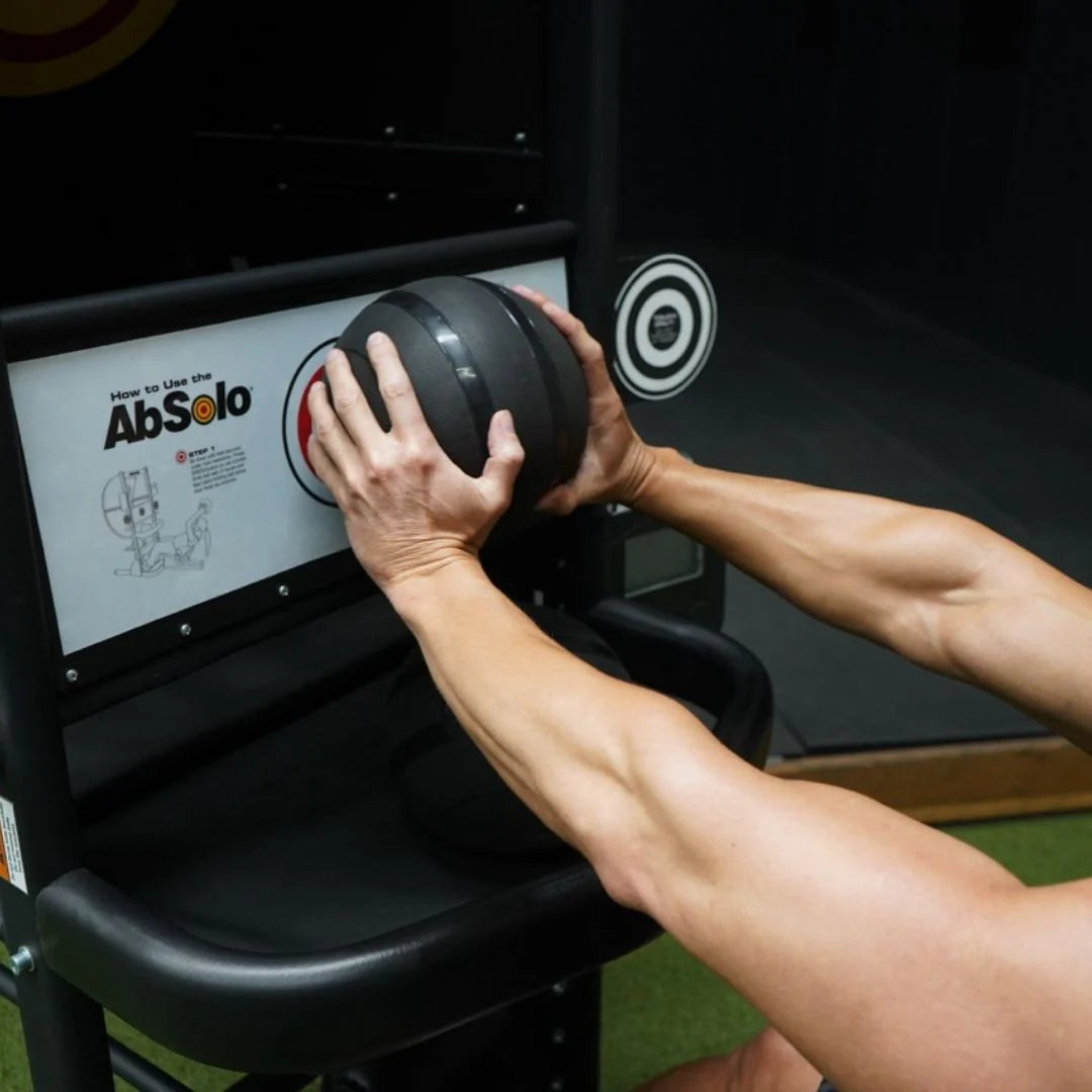 Machine in use by athlete shown touch ball on target up close