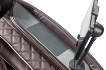 Close up of wireless charging pad on chair arm