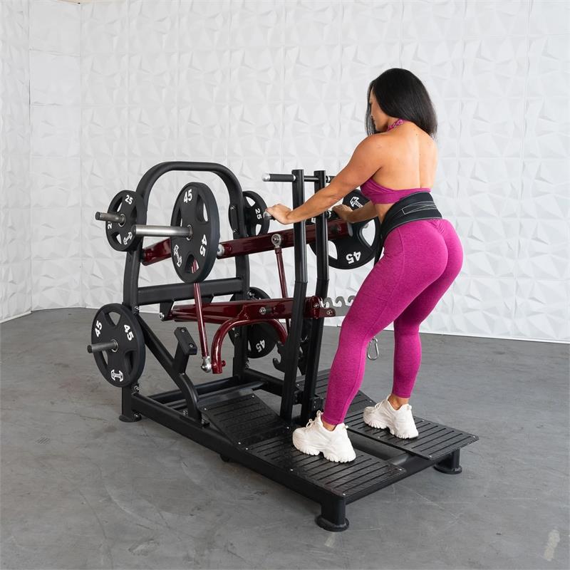 Plate load belt squat machine|In use start position|In use squat position