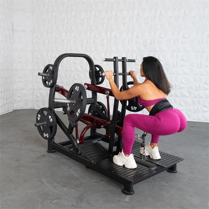 Plate load belt squat machine|In use start position|In use squat position