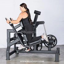 Female athlete using glute swing machine side view