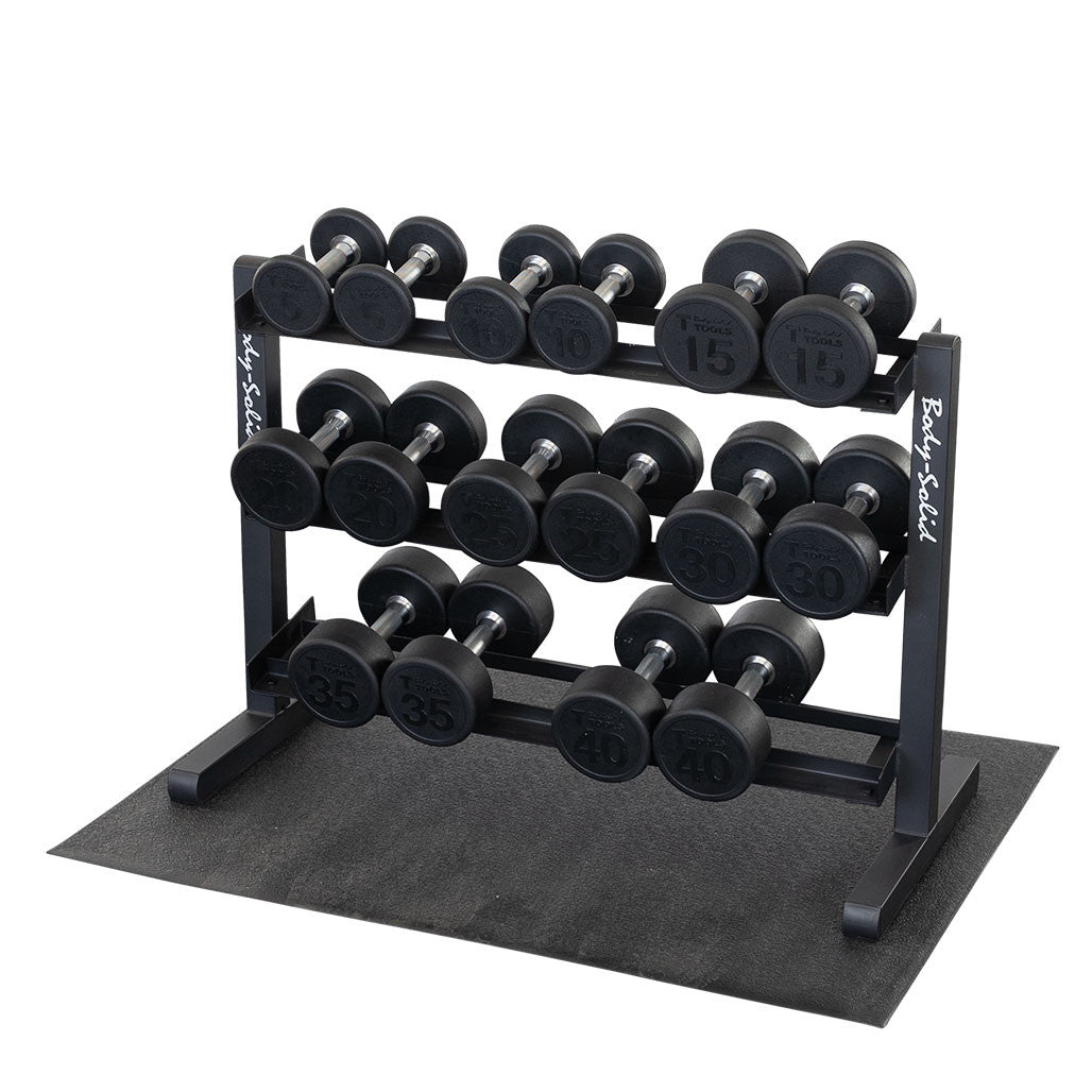 Rack loaded with round dumbbells