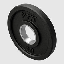 Closeup of 2.5lb rubber Olympic plate in color black with embossed logo and lb designation