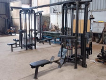 Jungle gym shown on the floor of a fitness facility from the right  front angle