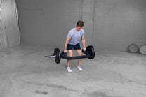 Bar without weights|Bar loaded with weights|Bar in loading position|Bar jack foot|16.25 inch sleeve|Bar in use