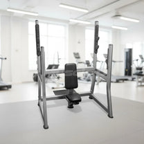 Olympic military shoulder bench shown on gym floor