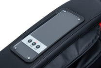 Closeup view of the console that is located on the arm rest