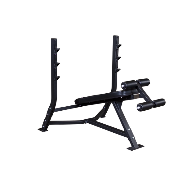Olympic Decline Bench|Bench in use|Leg hold down adjustment|Bench loaded with weights