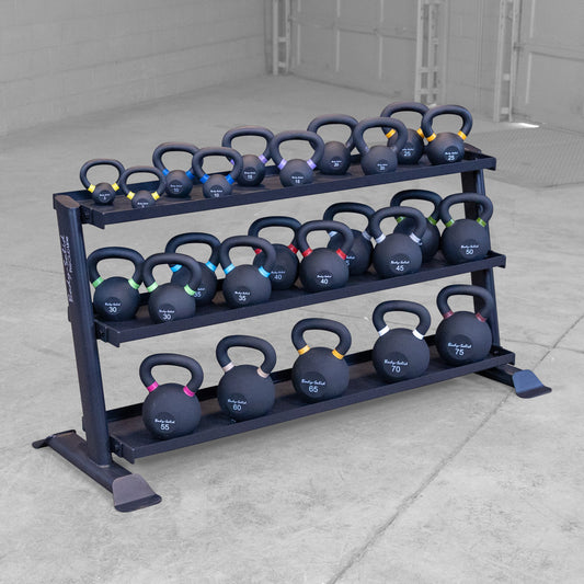 Rack loaded with cast iron kettebells