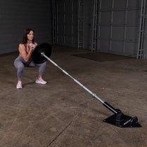 Land Mine Plate|In use t-bar row|In use squat|Rope attachment