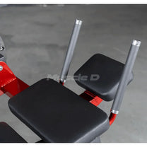 Close up of cushioned seat back with rubber grip handles