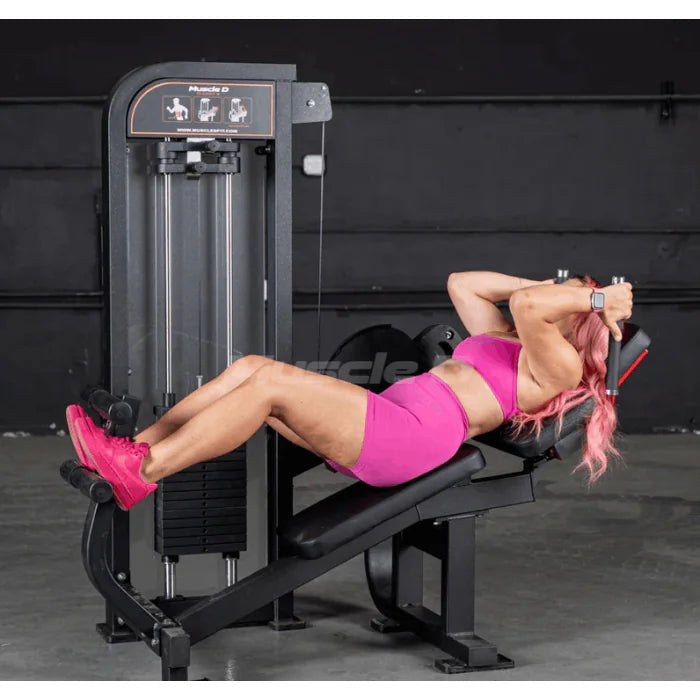 Athlete using machine shown in starting position