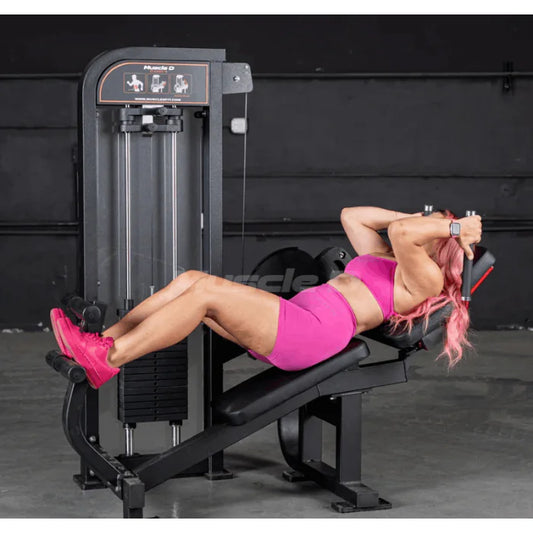Athlete using machine shown in starting position