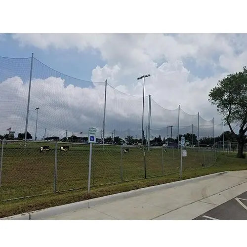 Alumagoal Back Stop System protecting a parking lot