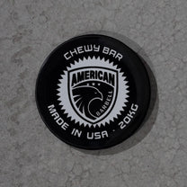 Closup of logo displaying American Barbell  logo and Chewy Bar text