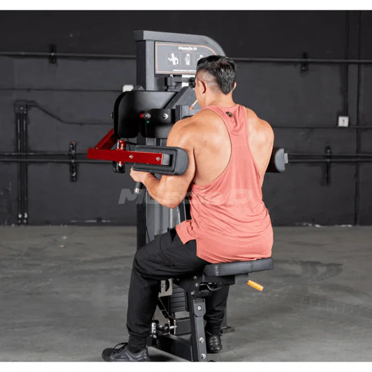 Athlete using machine shown in starting position