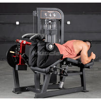 man doing prone leg curls