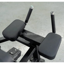up close view of elbow pads and handles for prone leg curl