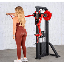 Athlete using machine to perform a single front lateral raise